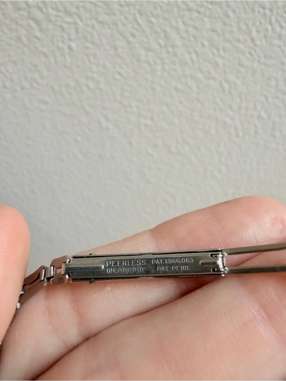 Vintage Art Deco-style Rectangular Winton Swiss wristwatch with a chain band